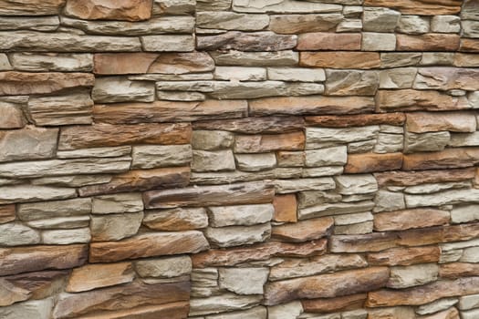 Brown shades color decorative design uneven stone stucco wall