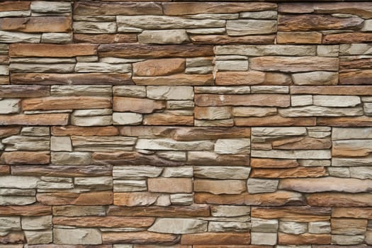 Brown shades color decorative design uneven stone stucco wall