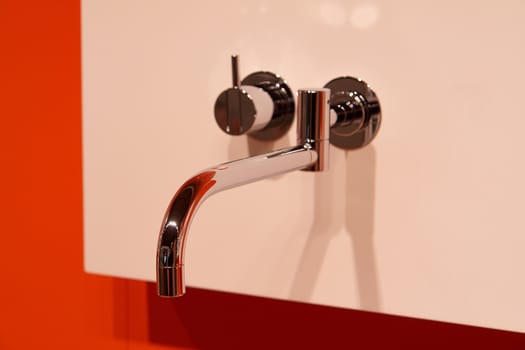 Closeup of modern design water tap faucet mixer for water                                