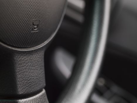 car interior detail with steering wheel