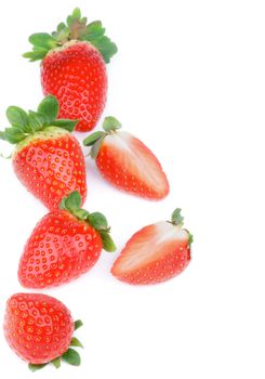 Ripe Strawberries Full Body In a Row and Halves isolated on white background. Top View