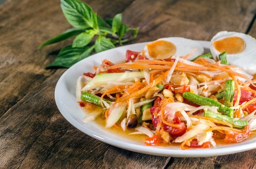 Papaya salad spicy salted eggs at a food stand   Thailand


