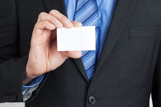 A business man showing his business card