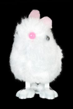 Close-up of a white fluffy bunny toy.