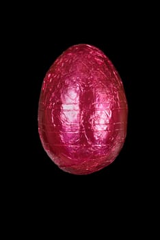 Close-up of a pink chocolate Easter egg.