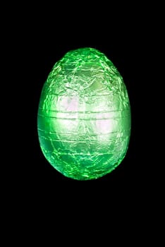 Close-up of a green chocolate Easter egg.