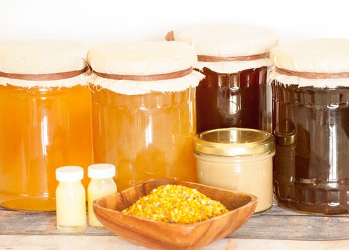 variety of raw organic honey bee products