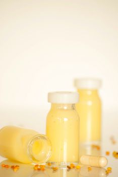 raw organic royal jelly in a small bottle