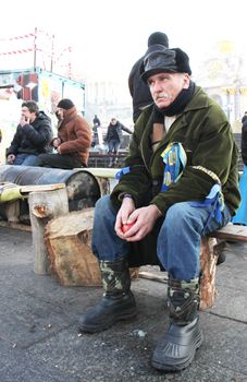 KIEV, UKRAINE - DECEMBER 24: Unidentified man during anti-governmental and pro-European integration protests on December 24, 2013 in Kiev, Ukraine