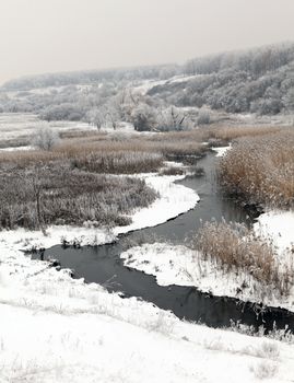 Winter scenic of the River Kalynova, Makeevka, Donetsk region, Ukraine. 