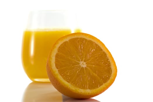 macro orange fruit with glass isolate on white