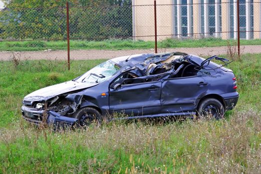 Destroyed blue car after an traffic accident.