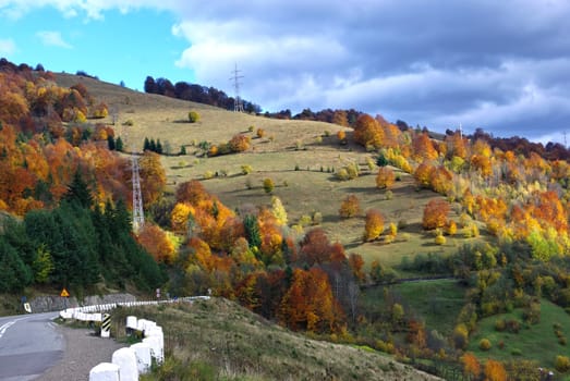 Road through mountain in autumn.