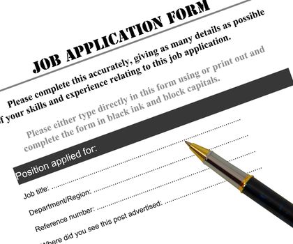 Completing a job application form with pen
