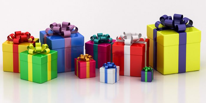 many-colored gift boxes with varicolored ribbon on a white background