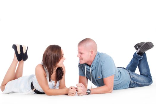 Young adults in a white studio having fun