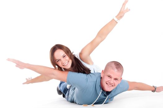 Young adults in a white studio having fun