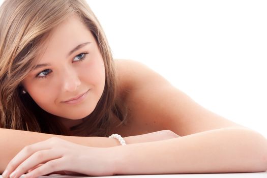 Young teenager in de studio on white