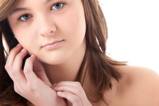 Young teenager in de studio on white