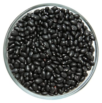 Glass Bowl of Unwashed Raw Black Beans Over White