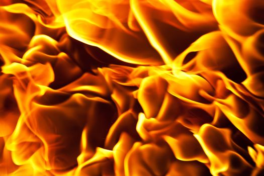 Beautiful yellow and orange hot fire on black background