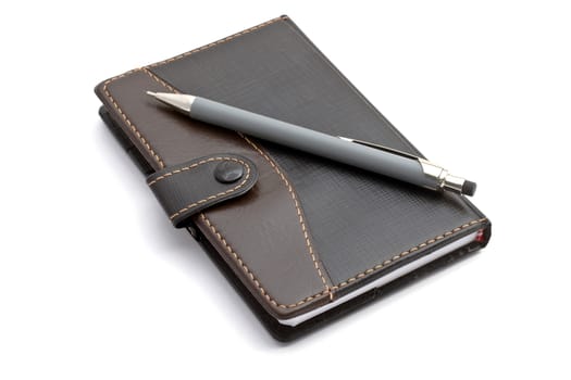 Black notebook and Mechanical pencil isolated on white 