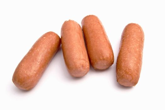 Mini sausages isolated on white background 