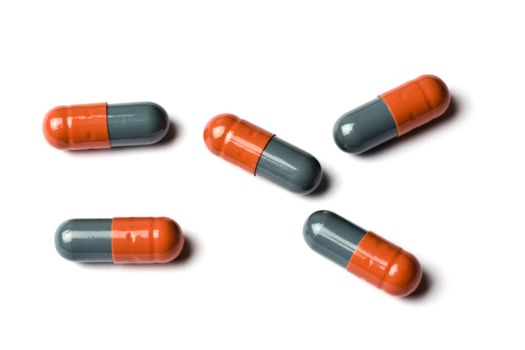 A few capsules isolated on white background 
