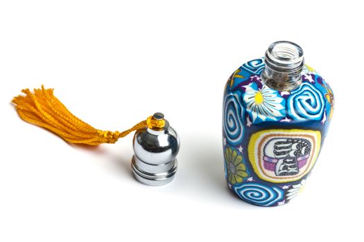 Beautiful classic Abra style perfume bottle isolated on white