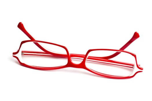 Red glasses isolated on white background 
