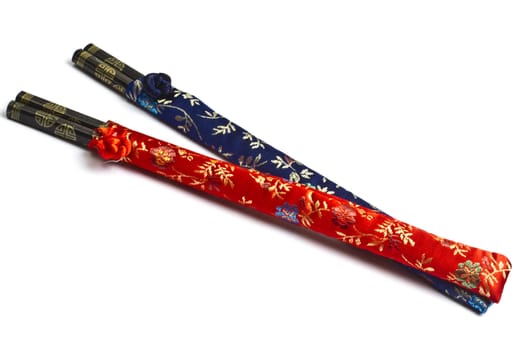 Two set of chopsticks isolated on white background