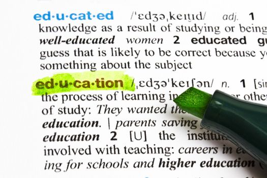 The word " education" highlighted in a dictionary