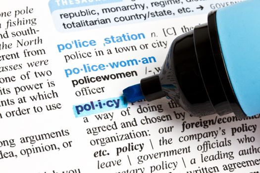 The word "Policy" highlighted in a dictionary