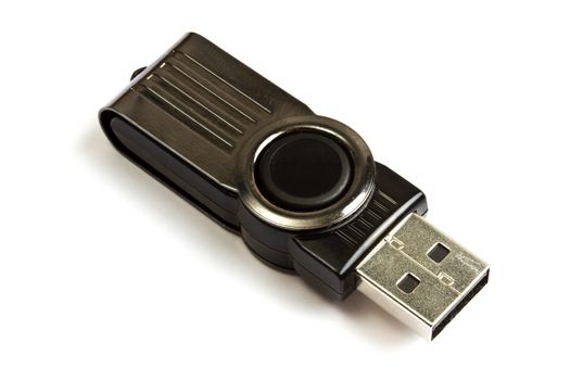A black USB memory stick isolated on white background