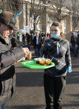 KIEV, UKRAINE - DECEMBER 24: Unidentified girl during anti-governmental and pro-European integration protests on December 24, 2013 in Kiev, Ukraine