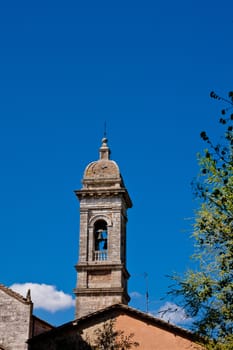 An old big medieval tower in San Quirico d'Orcia
