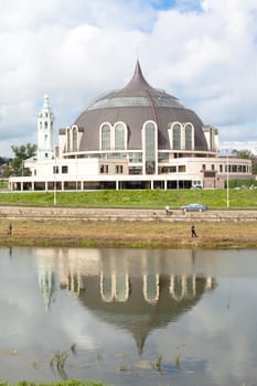 Tula cityscape with river and modern museum building
