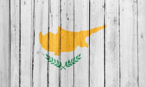 The Cypriot flag painted on a wooden fence