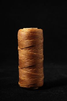 Roll of Twine isolated on a Black Background