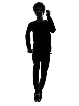 one african handsome young man running in silhouette studio isolated on white background