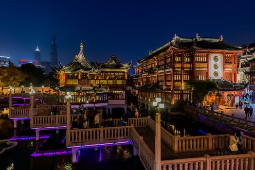 Shanghai, China - April 7, 2013: ancient tea house Fang Bang Zhong Lu old city at night in the city of Shanghai in China on april 7th, 2013