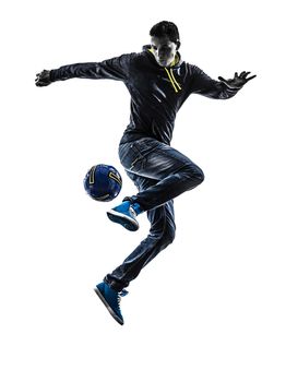 one caucasian young man soccer freestyler player in silhouette on white background