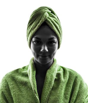 one woman wrapped in towel portrait in silhouette on white background