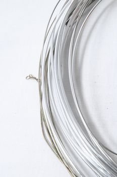 Lot of Different Metal Wire Isolated on a White Background