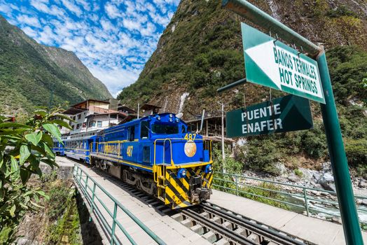 Aguas Calientes, Peru - July 17, 2013: train between Aguas Calientes and Ollantaytambo in the peruvian Andes at Cuzco Peru on july 17, 2013