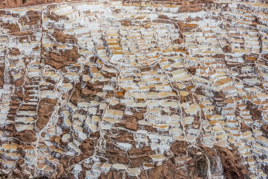 Maras salt mines in the peruvian Andes at Cuzco Peru