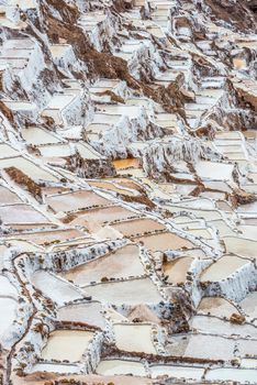 Maras salt mines in the peruvian Andes at Cuzco Peru