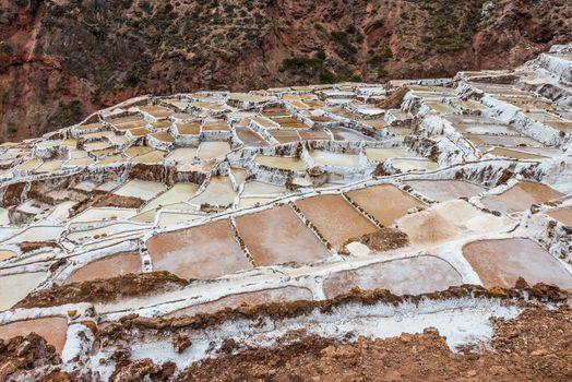 Maras salt mines in the peruvian Andes at Cuzco Peru