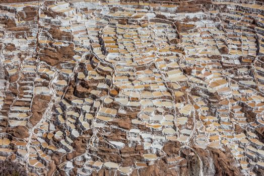 Maras salt mines in the peruvian Andes at Cuzco Peru