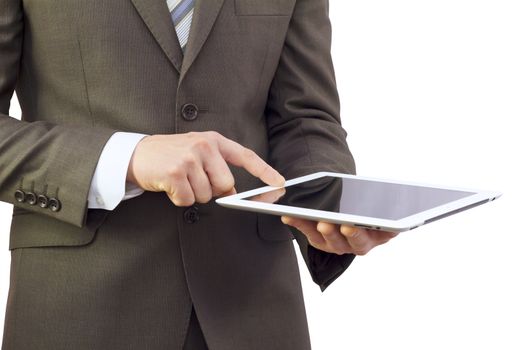 Businessman in a suit holding a tablet computer and finger presses the button